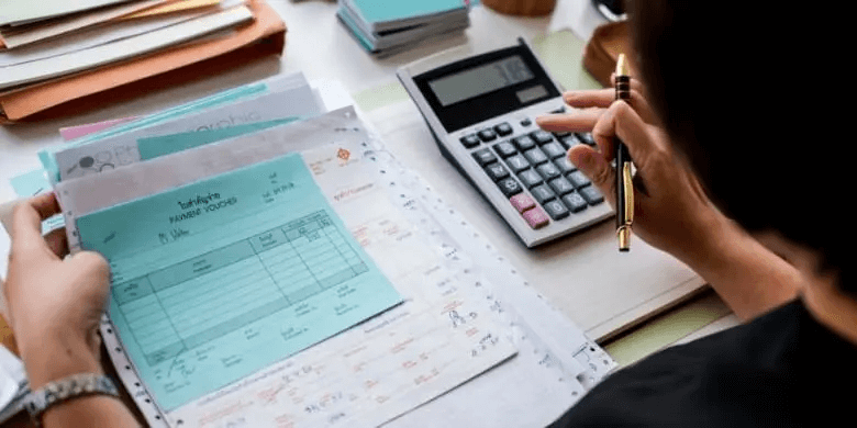 A person checking financial statements