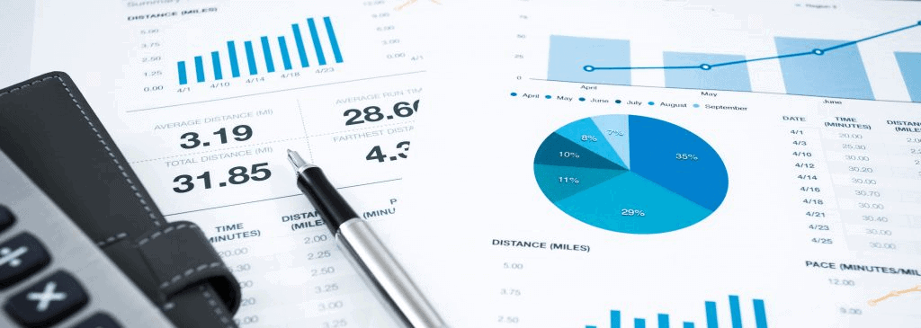 financial reports and a pen